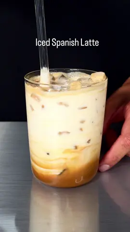 Iced Spanish Latte ☕️🥛This delightful drink combines the sweetness of condensed milk and richness  of double espresso flavor. Mix with ice cubes to taste for a really refreshing experience 🧊 A recipe that only takes 3 simple ingredients and less than 5 minutes :)  Ingredients: - Condensed Milk ( 2 tbsp ) - Double shot of espresso  - Ice  - Milk  #coffee #coffeetiktok #homebarista #homecafe #espresso 