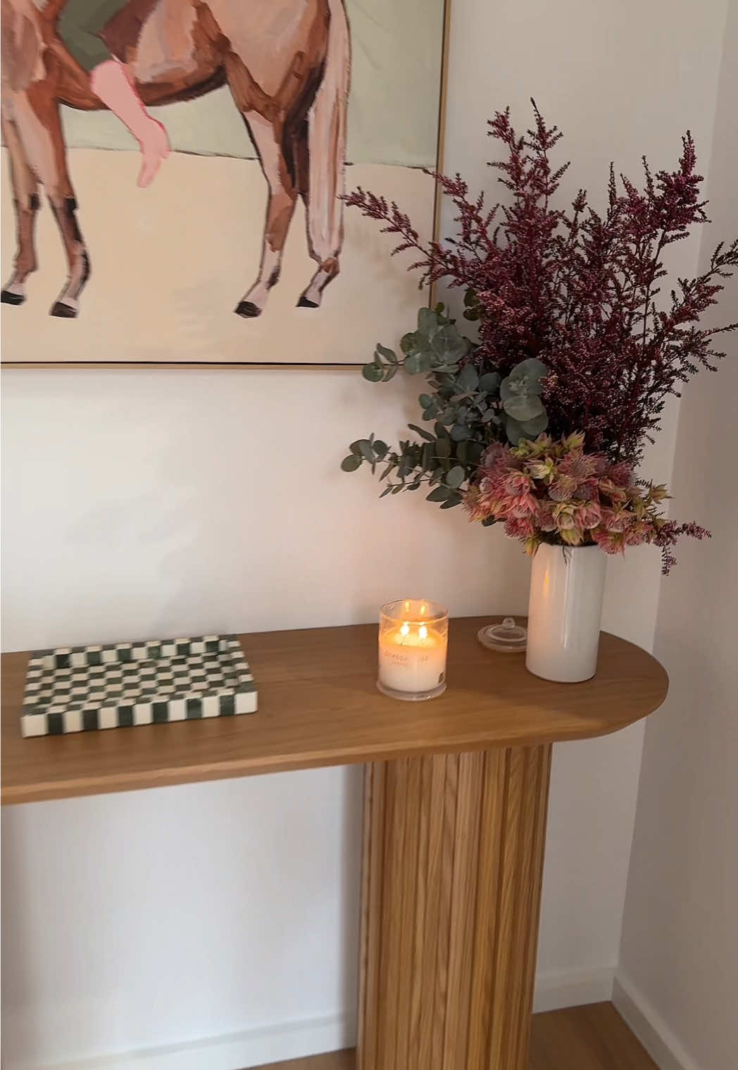 Entry way upgrade 🤎 Love our new hall table from @I N T E R I O R  S E C R E T S  Florals @fig_and_bloom  Artwork @Adairs  Candle @glasshousefragrances  #homedecor #mumlife #homedesign #interiordecor #fyppp 