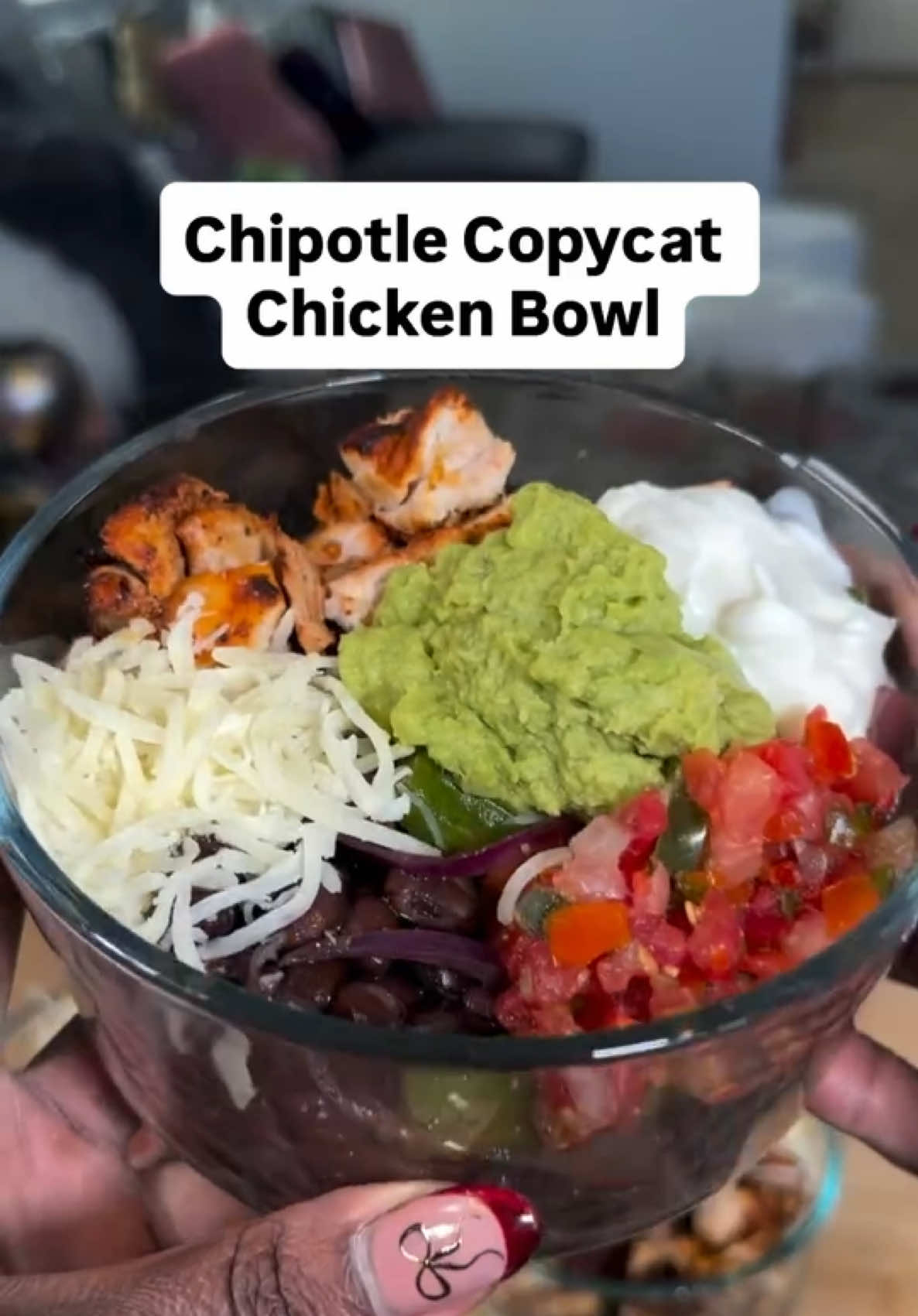 Chipotle Copycat Chicken Bowls 🔥 (via @jasminemays)  Here’s how I made 6 flavorful, macro-friendly bowls: Instructions STEP 1: Marinate the Chicken In a blender, combine chipotle peppers in adobo, avocado oil, cumin, oregano, black pepper, garlic, chili powder, and water. Blend until smooth. Pour the marinade over the chicken thighs in a large bowl or zip-top bag.  Cover and refrigerate for at least 4 hours (overnight is best). STEP 2: Cook the Chicken Oven Method: Preheat oven to 350°F. Heat a cast iron skillet sprayed with avocado oil over medium-high heat. Sear the chicken for 5-7 minutes on one side, flip, then transfer the skillet to the oven. Bake for ~15 minutes or until the chicken reaches an internal temperature of 165°F. Air Fryer Method: Spray the air fryer basket with avocado oil spray. Lay the chicken in a single layer and cook at 380°F for 15-17 minutes, or until the internal temperature is 165°F. STEP 3: Sauté the Veggies Heat 1/2 tbsp. avocado oil in a skillet over medium heat. Add sliced bell pepper and onion. Sauté for 5-7 minutes, then season with 1 tsp. dried oregano. STEP 4: Prepare the Cauliflower Rice Spray a skillet with avocado oil spray and heat over medium. Add the frozen cauliflower rice and cook until heated through. Stir in lemon juice, lime juice, and fresh cilantro. STEP 5: Assemble the Bowls Start with a base of cauliflower rice. Add black beans, sautéed veggies, and chicken. Top with optional extras like lite mozzarella, pico de gallo, Greek yogurt, or guacamole. Macros per Bowl (makes 6): 541 calories | 24.6g fat | 29g carbs | 40.8g protein 💡 Calorie-Saving Tip: Swap chicken thighs for chicken breast and reduce black beans! Black Foodie Finder 🧡