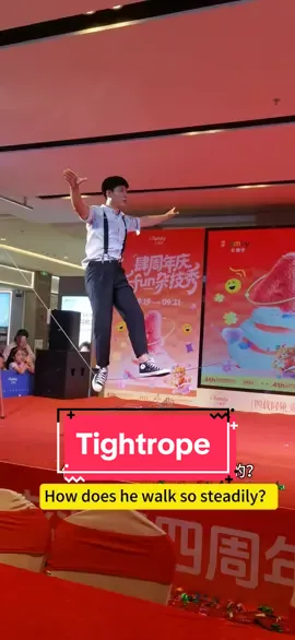 NO WAY! Tightrope walker does splits + rolls… my mind’s gone 🤯#acrobatics #tightrope 