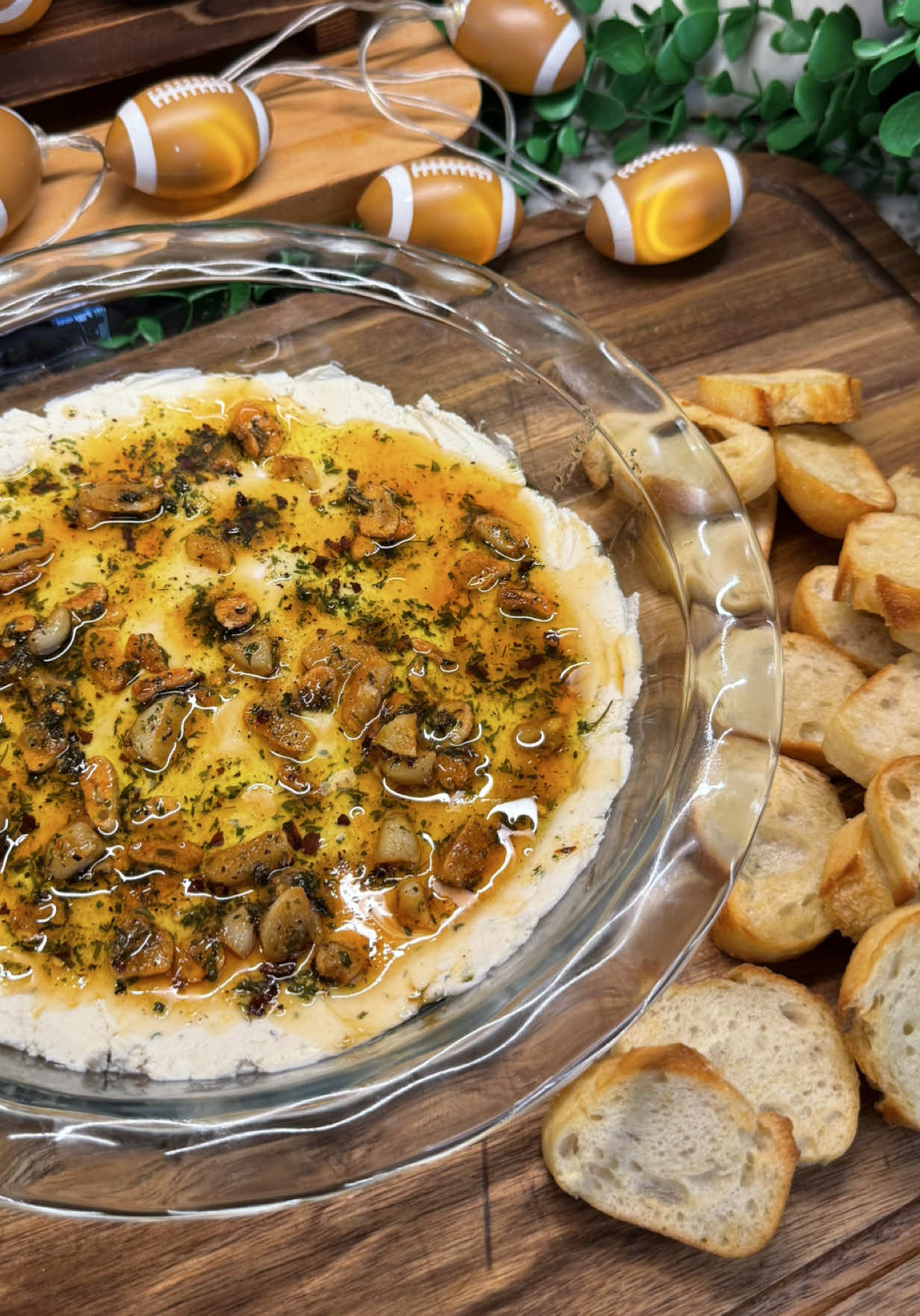 tastebud touchdowns, week 4: hot honey boursin dip🏈✨🍯 this dip will be your new obsession for game day! super easy & packed full of flavor- this appetizer is a must for your game day spread! Ingredients: - 8 cloves garlic, roughly chopped - 1/3 cup olive oil - 1 tsp red pepper flakes - 1 tsp black pepper - 1/2 tsp salt - 1 tsp onion powder - 2 tsp dried parsley - 2 packs (10 oz) @Boursin Cheese  - 2.5 tbsp hot honey #gamedayfood #gamedayrecipes #gamedaysnacks #gamedayappetizers #creatorsearchinsights 