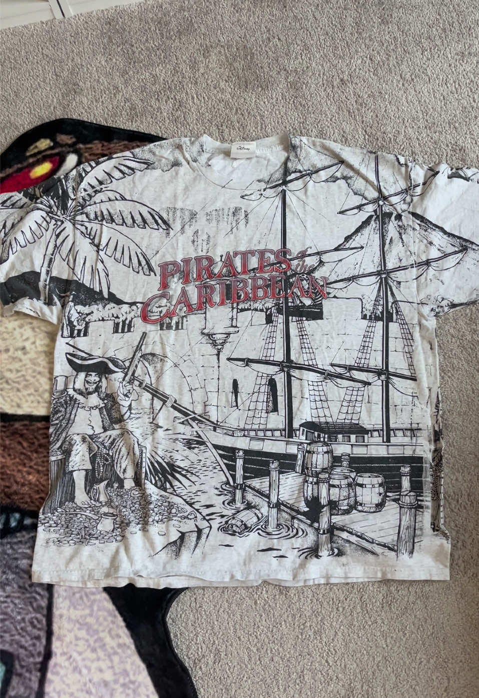 Vintage tshirt series part 29! Today we take a look at an early 2000’s @Disney Parks Pirates of the Caribbean AOP attraction tee! What’s your favorite pirates ride tee?  #disney #disneyworld #disneyland #vintage #series 