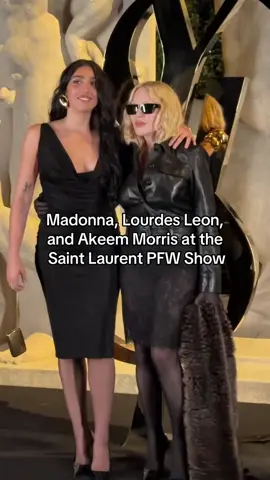 It's a family affair! #Madonna arrived with daughter #LourdesLeon and partner #AkeemMorris for #saintlaurent's spring 2026 show. See more front row spottings from #ParisFashionWeek at the link in our bio.
