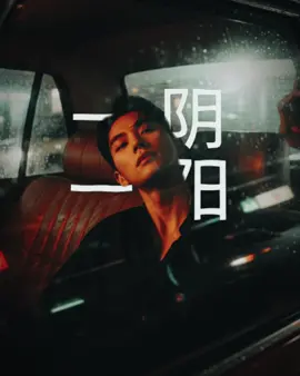 Wong Kar-wai's cinematic-style realistic portrait Using an uploaded photo of as a reference, highlighting the jawline and neck to create a statuesque look, while maintaining the shape and identity of the face. Pose: Sitting with his head against the window, his hand resting on the edge, the streetlight's light shining through. Setting: Inside an old taxi with faded leather seats, the glass fogged up by rain, and the streetlight's light refracting into blurred streaks. Camera angle: Shot from outside the window, with overlapping reflections on the face. Lighting: Red-green neon lights passing by, causing the face to change color with the light. Clothing: Black button-down shirt, slightly open, hair appearing damp. Image tone: Red-green contrast, thick film grain, pronounced motion blur, and a hazy glow around the vehicle's headlights. Mood: Loneliness, solitude, a sense of a big city with no answering voice. #CapCut #gemini ai #fyp #leechaemin 