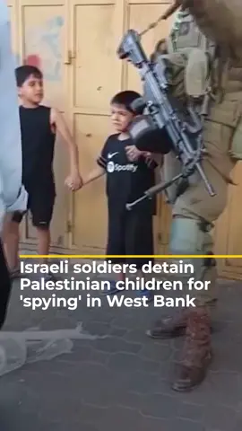 Israeli soldiers were filmed detaining two Palestinian children in Hebron, in the occupied West Bank, while demanding to know their father’s whereabouts. When a passerby intervened and urged their release because of their young age, a soldier replied, “I don’t care”. #news