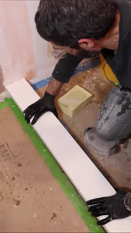 Quartz curb top tips…I’m using a 1/2-inch by 1/2-inch u-shaped trowel from @Perfect Level Master both on the quartz and the Schluter curb. I compress the quartz top into the mortar, make it level across the length, and pitch it slightly toward the shower. This piece of quartz is 3 cm thick and about 47 inches long 🔥 #showerremodel #bathroomremodel #homerenovation #homerepairtutor 