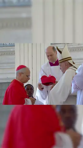 Cardinal Robert F. Prevost receives the red biretta from Pope Francis at the 2023 consistory.
