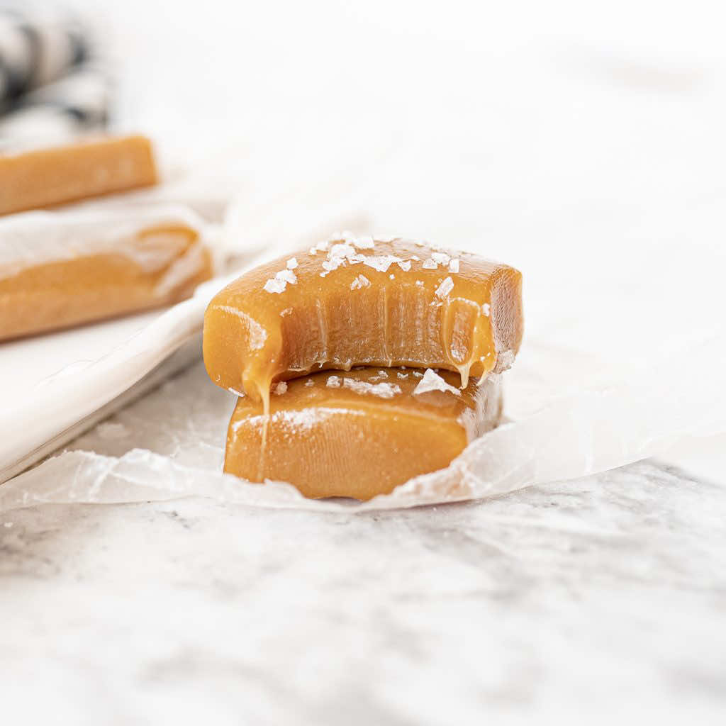 Homemade caramels have never been simpler! 🔥 You’re just a handful of ingredients and a few minutes in the microwave for tasty caramel. Cut into square or wrap individually in wax paper! Just search ‘Easy Microwave Caramel Candies’ using the link in my bio for the full recipe! ✨  caramel | microwave | baking | easy baking | fall | fall baking | autumn | autumn baking | treat | easy | holiday | holiday baking