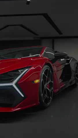 Sharper than red itself: Lamborghini Revuelto.​ An #AdPersonam masterpiece fading from Rosso Bia to Nero Granatus. A tone forged to speak words of power at every glance, for every line, in every moment.