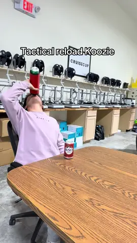 Spring loaded koozie 