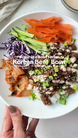 Meet the very first bowl in my new series ✨ Better in a Bowl ✨  Bowl meals are superior for many reasons and I'm really excited to share some of my faves with you. First up is this KOREAN BEEF BOWL! It's packed with flavor, protein and comes together quick for an easy weeknight option! 💪🔥 Here’s how to make it: Beef • 1 lb lean ground beef, I like using 93/7 • ¼ cup low sodium soy sauce or tamari • 2 Tbsp coconut sugar or brown sugar • 1 Tbsp rice vinegar • 1 Tbsp sesame oil • 1 Tbsp gochujang • 2 tsp fish sauce • 2 cloves garlic, minced (I used the frozen cubes) • 1 tsp fresh ginger, grated (I use the frozen cubes) Bowl • 1-2 cups carrot ribbons • 1-2 cups fresh cucumbers, julienned • 1-2 cups sliced red cabbage • ½ cup Kimchi • Sliced green onion • Spicy mayo, recipe below • Cooked white rice or cauliflower rice • Sesame seeds Spicy Mayo • 3 Tbsp mayo, I like avocado oil mayo • 1 tsp Sriracha • 1 Tbsp water #koreanbeefbowl #highprotein   #hig#highproteinrecipes  #bowlmeals 