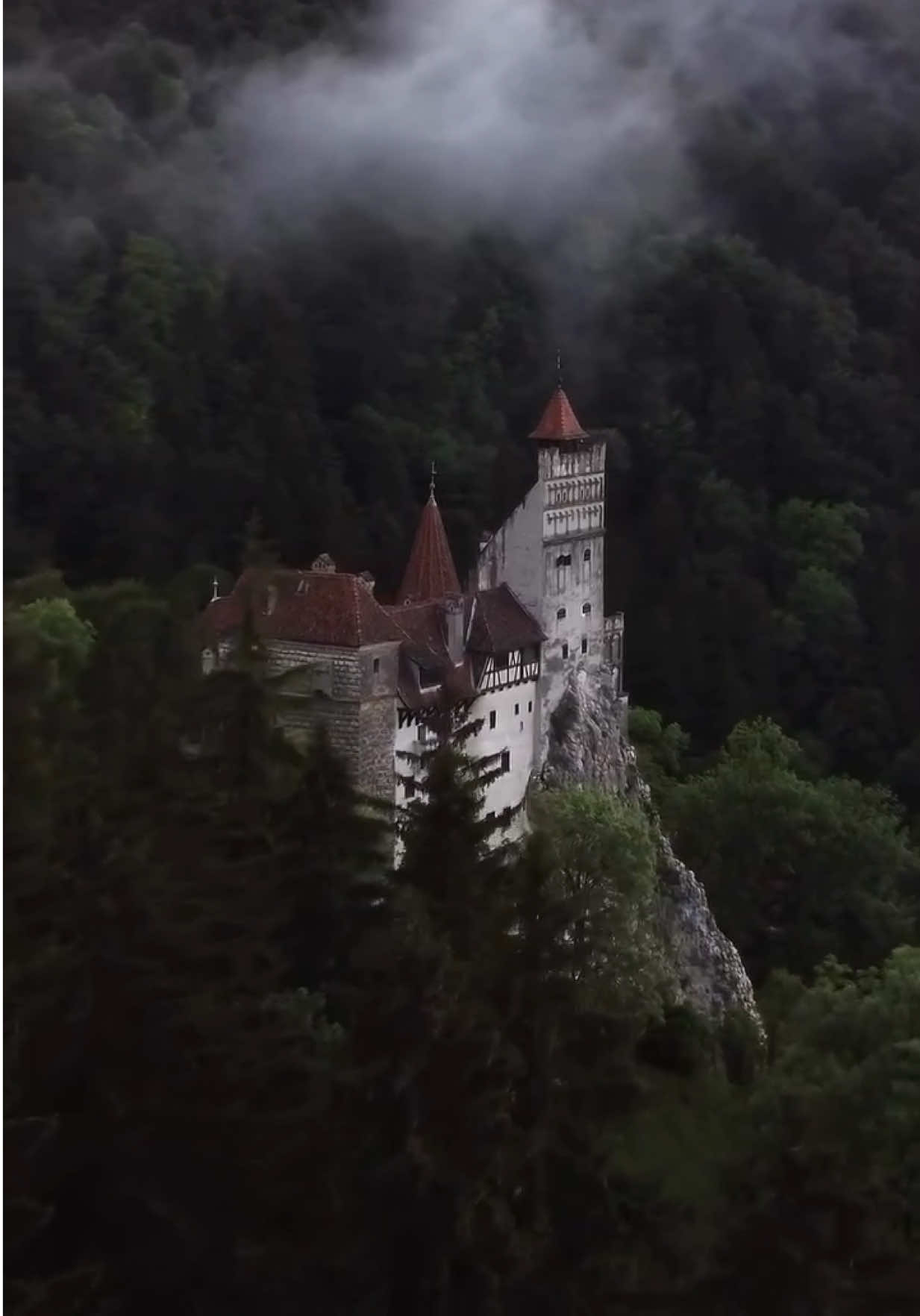 Do you believe in vampires? Bran Castle in Transylvania is famous for spawning the original vampire legend of Count Dracula. Long before sparkly vampires à la Twilight, the original bloodsucking creature of the night was said to roam the shadowy halls of this Transylvania ‘Dracula’ castle. Irish author Bram Stoker invented Dracula as we know him today. The count-turned-villain was the main character of Stoker’s 1897 Gothic horror novel, set in a vast (and creepy) castle perched high above a valley. Beneath the stone fortress, a river flowed past. Whether fact or fiction, its resemblance to Bran Castle is uncanny, notwithstanding the fact that Stoker never actually visited the castle. In fact, he never even set foot in Romania! Stoker did look to history for some inspiration, however. Although Dracula is said to be entirely fictional, Stoker modelled the predator after a real-life ruler, Vlad III Dracula, otherwise known as Vlad the Impaler or Vlad Dracula. And this blood-thirsty ruler of Wallachia did actually stay at Bran Castle, albeit only for a few months as a prisoner of the Hungarian army in the 15th century. Romanian locals believed that strigoi roamed the area after dark. These spirits rose from the dead and fed on their victims’ blood. Sound familiar? As the story goes, the strigoi were actually ‘normal’ people during the day. Come nightfall, however, their souls left their sleeping bodies to torment their neighbours. Anything else you would add to this story? Video by @george.mihaiescu [Bran Castle, Dracula Castle, Transylvania Tourism, Romanian Castles, Gothic Architecture, Medieval Fortress, Vlad the Impaler, Carpathian Mountains, Historical Landmark Romania, Bram Stoker Inspiration, Romanian Myths, Castle Tours Romania, Transylvanian Legends, Romanian Cultural Heritage, Fortress in Romania, Dracula Tourism, Medieval Romanian History, Carpathian Fortress, Bran Castle History, Vampire Legends Romania] #Travel #InstaTravel #TravelGram #Wanderlust #Traveling