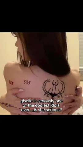 ningning's matching tattoo...  YURI #aespa #kpopfyp #fyp #goviral #aespagiselle giselle back tattoo ningselle matching tattoo ningning henna