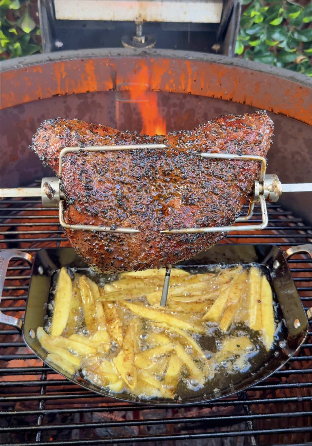 Rotisserie Bourbon Tri-Tip Sandwich w/ Tallow Fried Fries  🔥 Cooked on the Kamado Joe Joetisserie using the Karbon Steel Half Moon Pan Pretzel buns, bourbon sauce, and tallow fries… this isn’t your average sandwich 🥨🥃🍟 Full recipe ⬇️ ⸻ 🥩 Ingredients Tri-Tip 	•	1️⃣ 2–3 lb tri-tip 	•	W sauce (binder) 	•	Kinders Bourbon Steak Rub 	•	Kinders Cowboy Butter Rub 	•	🥨 Pretzel buns, toasted w/ butter 	•	🧀 Jack cheese 	•	🌱 Arugula Bourbon Sauce 	•	2 tbsp bourbon 🥃 	•	1/2 cup ketchup 	•	1/4 cup brown sugar 	•	1 tbsp W sauce 	•	1 tbsp Dijon mustard 	•	2 tbsp maple syrup 🍁 	•	1 tbsp hot honey 🌶🍯 	•	1/2 tsp hot sauce 	•	1 tbsp apple cider vinegar Fries 	•	3 russet or gold potatoes, cut into fries 🍟 	•	1–2 cups beef tallow 	•	Kinders Garlic Butter seasoning ⸻ 🔥 Method 1️⃣ Season tri-tip with binder + rubs. Set Kamado Joe Joetisserie at 300°F. Place the Karbon Steel Half Moon Pan underneath to preheat. 2️⃣ Make the bourbon sauce: combine ingredients in a saucepan over medium-high. Simmer until thick and glossy. 🥃✨ 3️⃣ Cut fries, soak in ice water 20 mins. Heat tallow in the Karbon Steel Pan to 350°F. Fry until golden brown. Keep warm in the oven, or double-fry after slicing the tri-tip. Toss in garlic butter seasoning. 🍟🔥 4️⃣ Pull tri-tip at 127-130°F internal. Rest 20 mins, then slice thin against the grain. 5️⃣ Build it: toasted pretzel bun 🥨 + tri-tip 🥩 + bourbon sauce 🥃 + jack cheese 🧀 + arugula 🌱. Plate with the crispy fries. ⸻ ⚒️ The Karbon Steel Half Moon Pan does double duty — catching drippings while frying the fries. Best enjoyed with your favorite bourbon, an Old Fashioned 🥃, or an ice-cold beer 🍺. #KamadoJoe #rotisserie #tritip #bbq #asmr  @Kamado Joe @Jealous Devil @MEATER @Bear & Burton's @Kinders @Kinder's Flavors @waringproducts @TheWagyuWindow @Melinda's Hot Sauce @heinz @Heinz UK @Heinz Canada @Costco Wholesale @WhistlePig Whiskey @cangshancutlery @Food Network @foodandwine @Gordon Ramsay @Foodie @Foodporn @Foodies @FOOD 🍟 