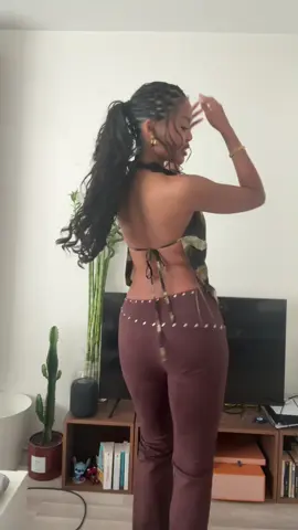 outfit is @Fashion Nova (details : riley swirl satin halter top, round em up faux suede flare leg pant 34)