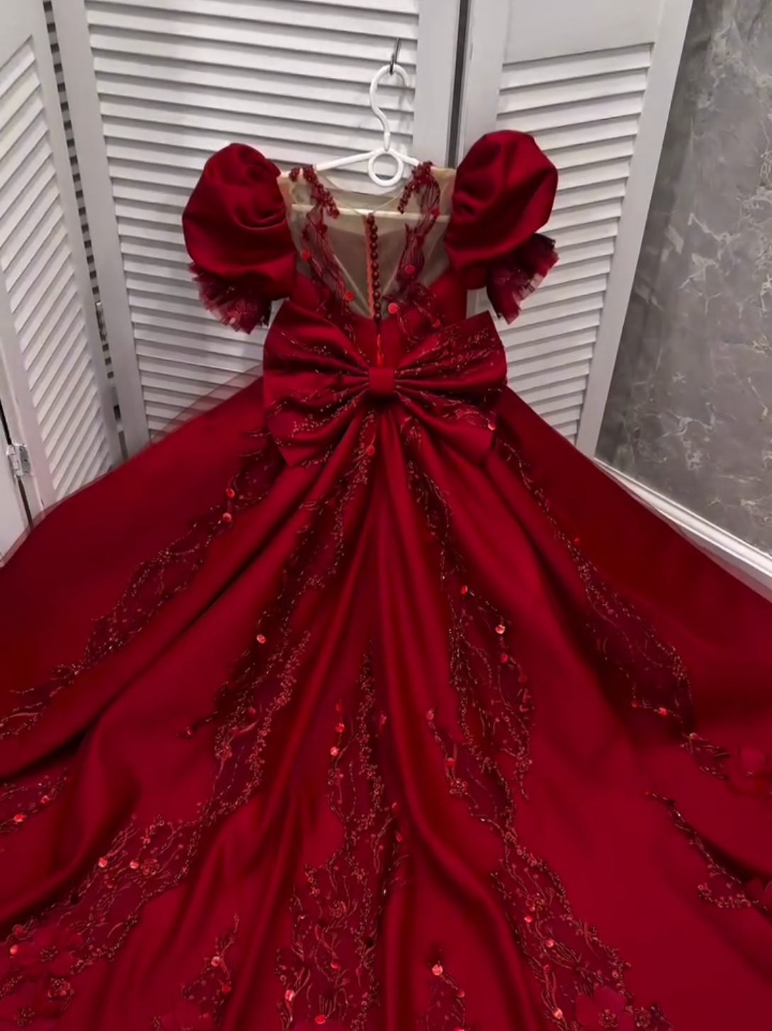 ✨ Royal Red Glamour for Your Little Princess 👑 From Balkumari Boutique, presenting our latest handcrafted masterpiece — a deep red luxury gown designed to make your baby shine like royalty 💫 Featuring elegant puff sleeves, intricate floral embroidery with sparkling sequins, and a grand statement bow at the back — this dress is made for unforgettable moments ❤️ Perfect choice for birthdays, weddings, and festive celebrations — because every princess deserves a touch of Balkumari elegance ✨ 📍Made on order | Available in all sizes 💌 DM us to customize your baby’s dream dress today! #BalkumariBoutique #RoyalBabyDress #PrincessStyle #LuxuryKidsWear #NepalFashionDesigner