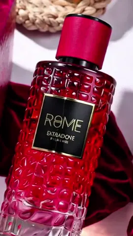 “ROME EXTRADOSE Pour Femme: where bold red meets irresistible fragrance. 💃 #SignatureScent #LuxuryPerfume #ForHerFragrance #TikTokTrend 