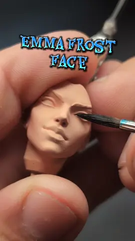 painting the face eyes, lips, and eyebrows for Emma Frost from Marvel rivals  3d resin printed  paints  black applied to the eyelashes avoiding the deep set eyelid white gray on the eyeball dark Prussian blue for the initial Iris sky blue as the iris highlight color Andrea blue mixed with alien purple for the lipstick yellow ochre for the little bit of hair and eyebrows #painting #emmafrost #marvelrivals 