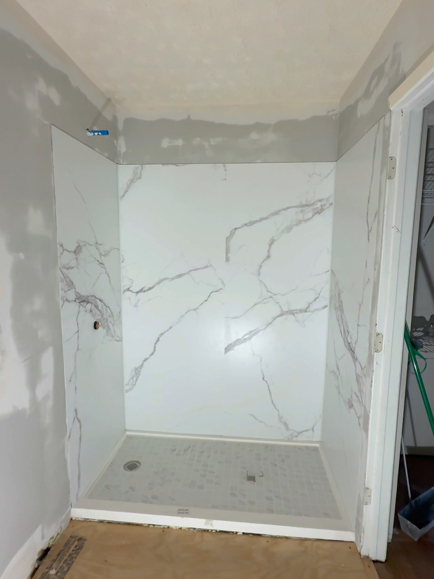 Laminated wall panel installation! Elegant marble-style finish for a clean and modern shower look 🤍 Quick installation, durable, and waterproof — perfect for bathrooms 💪 #BathroomRemodel #WallPanelInstallation #MarbleLook #ShowerDesign #ModernBathroom #RemodelingProject #PVCPanels #HomeImprovement #BeforeAndAfter #ProfessionalWork #InteriorDesign #Cincinnati