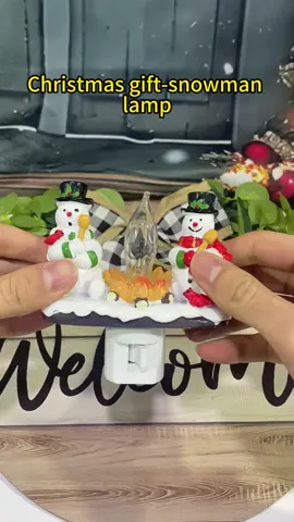 A falme lamp glows,the snowman stays with you till winter clears#christmasdecor #cozyathome #tiktokshop #fyp #foryou 