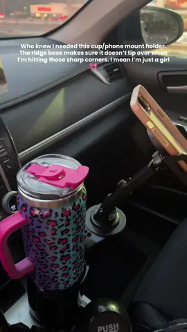 Who knew I needed this cup/phone mount holder. The ridge base makes sure it doesn’t tip over when I’m hitting those sharp corners. I mean I’m just a girl🎀 #cupphoneholder #cupholderphonemount #roadtrip #passengerprincess #tiktokshopholidayhaul 