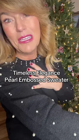 Beautiful sweater and pearls make it look so elevated✨ they’re on clearance currently today 12-8-25 when I posted this video #christmasfashion #womensfashion #fauxpearlsweater #christmassweater #sweater 