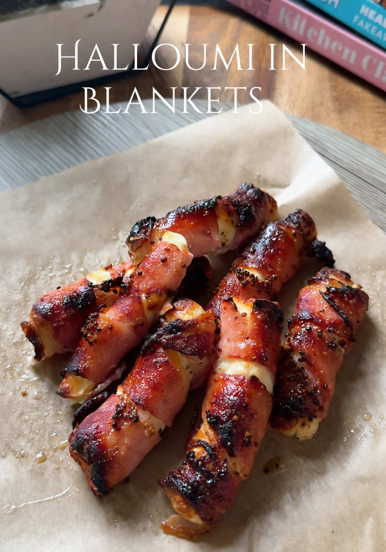 Halloumi in blankets 😍 recipe below!⬇️  Ingredients: -1 block or halloumi -1 pack of bacon  -1 tbsp honey  -1 tsp mustard  Method:   -chop your halloumi into sticks and wrap with your bacon  -place in the air fryer for 11 minutes on 190 degrees Celsius  -add your honey and mustard into a bowl and combine  -cover your halloumi blankets in the glaze and cook for a further 6 minutes on 190 and enjoy!  #halloumi #sidedish #EasyRecipes #quickrecipes #foodidea 