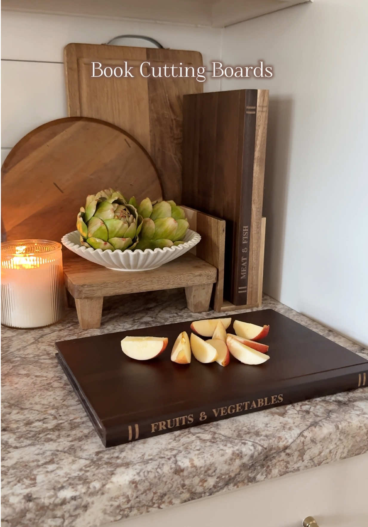 Amazon aesthetic and functional kitchen find! Book cutting boards!! I thought these were sooo pretty as well as useful! It comes in a set of 3 with a stand. They look like books but they are actually cutting boards! #amazonhome #amazonfinds #KitchenHacks #cuttingboard #kitchenfinds 