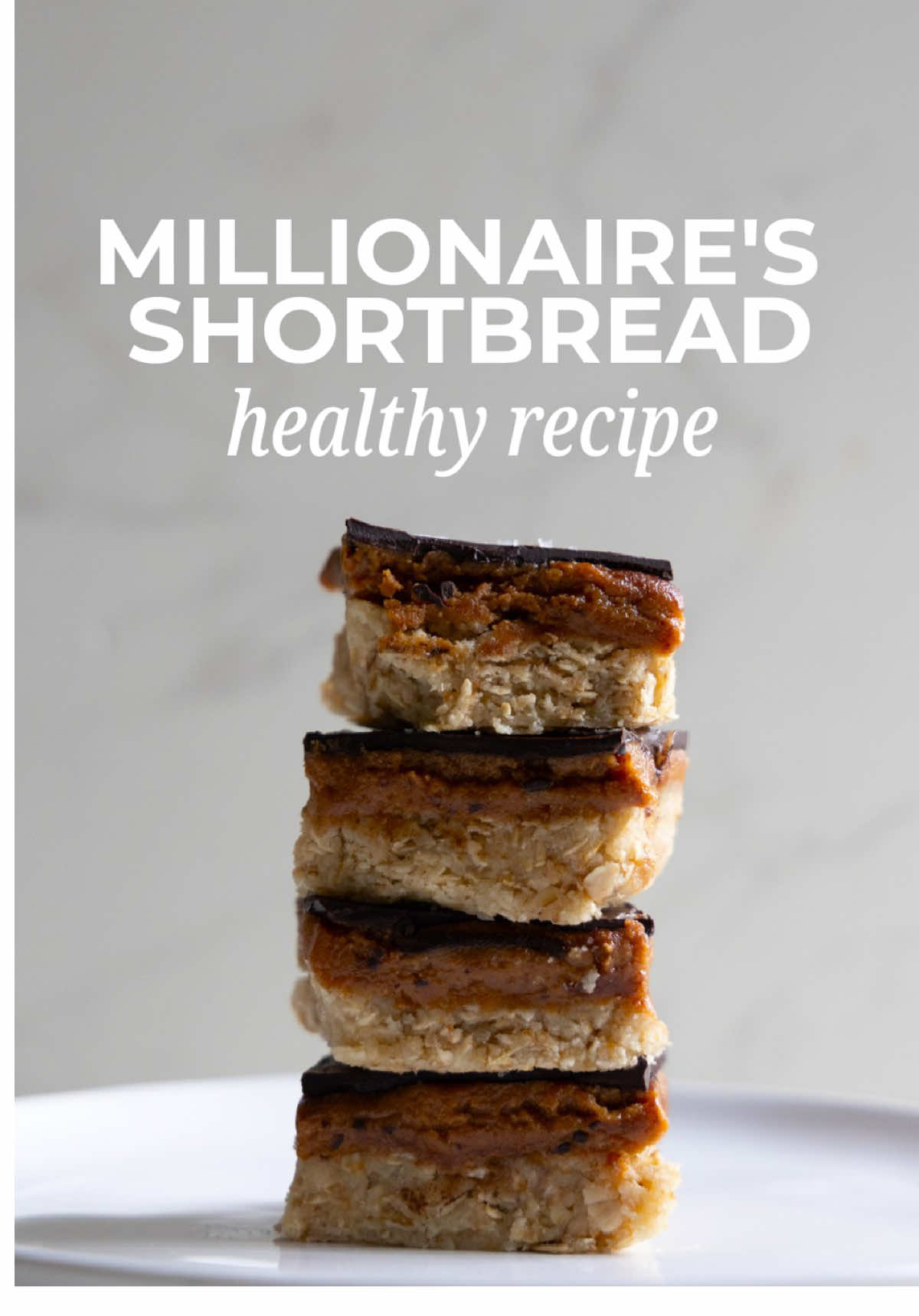 I can’t guarantee this will make you a millionaire, but I can assure you, it is worth a try! This dessert is rich and full of surprises. MAKES: 12 squares INGREDIENTS BASE LAYER 1 cup rolled oats 1 cup almond flour (or ground almonds) 3 tbsp coconut oil, melted 2–3 tbsp maple syrup or honey Pinch of salt ½ tsp pure vanilla extract CARAMEL LAYER ½ cup nut butter (peanut, almond, or cashew) 3–4 tbsp maple syrup or honey Pinch of salt ½ tsp pure vanilla extract CHOCOLATE TOPPING 80 g dark chocolate (70–85%) 1 tsp coconut oil (optional, for glossiness) METHOD 1. Mix the oats, almond flour, melted coconut oil, maple syrup, and a pinch of salt until sticky. 2. Press firmly into a lined loaf tin. Chill in the fridge for 30 minutes. 3. Make the caramel layer by combining the nut butter, maple syrup/honey, vanilla extract and a pinch of salt in a bowl. Pour over the chilled base and spread evenly. Chill in the fridge for another 15–20 minutes. 4. Finish by making the chocolate layer. Melt the dark chocolate with the optional coconut oil and pour over the chilled layers. Use a spatula to even the surface. Sprinkle on a pinch of sea salt and chill in the fridge until it sets (around 20 min).  5. Cut into 12 squares and enjoy! #millionaireshortbread #healthydessert #healthy #dessert #sweettreat