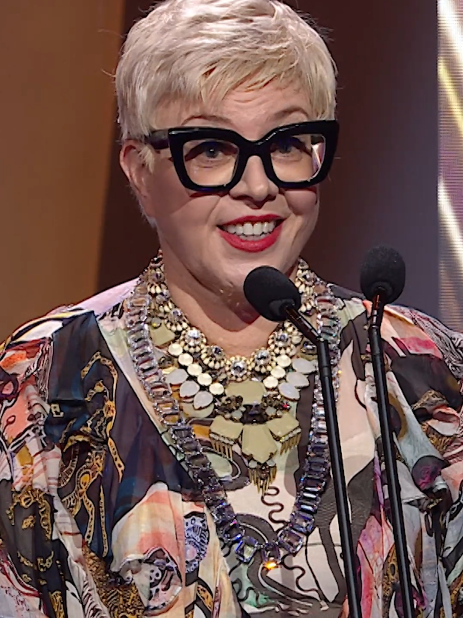 Catherine Martin takes the stage to present Best Lead Actress in Film. ✨🎬