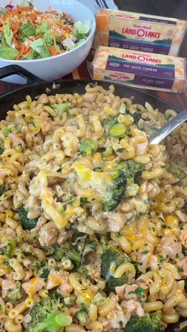 #sponsored Cheesy Chicken Broccoli Mac is an easy one pan dinner the whole family will enjoy! @Land O’Lakes  INGREDIENTS  1 lb chicken breast, cut into cubes  1 tbsp olive oil 1 onion, chopped  1/2 tsp each of salt and pepper 1 tsp each paprika, garlic powder, onion powder 1 tbsp ranch seasoning  3 1/2 - 4 cups of chicken broth  2 1/2 cups elbow pasta, uncooked  3 cups chopped broccoli  8 oz Land O Lakes® Co-Jack® Cheese Chunk, shredded 1/3 cup milk  Dried parsley  INSTRUCTIONS  Cut chicken into small cubes. Roughly chop broccoli into smaller pieces (just be careful not to chop too small or it will completely fall apart while cooking).  Add olive oil to a skillet over medium-high heat. Add the chicken and spread it out evenly in the pan. Add the chopped onion and season with salt, pepper, paprika, onion powder, garlic powder, and ranch seasoning. Stir everything well.  Once the chicken is pretty much fully cooked, add the uncooked elbow noodles, broccoli, and chicken broth. I recommend starting with 3 1/2 cups of chicken broth and adding an extra 1/2 cup if needed as the pasta cooks. Bring to a boil then reduce the heat to medium-low. Cover with a lid. Let cook covered for about 12-15 minutes or until the pasta is cooked.  Remove the lid and stir well. Let simmer for a few minutes if any extra liquid needs to reduce. Add half of the Land O Lakes® Co-Jack® Cheese, milk, and stir everything together really well. Top with the rest of the cheese and cover with the lid to let the cheese melt or pop it in the oven under the broiler for just a few minutes. Enjoy!  #EasyRecipes #dinner #onepanmeal 