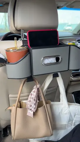 Stop digging for your phone. Phone always vanishing between the seats? This seat organizer gives it a home — plus spots for drinks, tissues, and hooks for your lanyard or mask. Everything stays put. #carstoragebox#garageessential #automotivemusthaves#caraccessoriesforwomen#rvaccessories