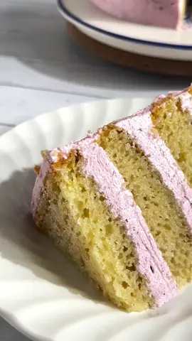 Mini Lemon Blueberry Layer Cake 🍋This cake is bright, zesty, so moist! It is layered with blueberry cream cheese frosting and decorated with fresh blueberries 🫐. No eggs - No dairy! Recipe 👇👇 Lemon Cake Recipe •180ml (3/4 cup) Milk ( unsweetened almond milk or any milk of your choice) •12ml (1 tablespoon) Lemon Juice, fresh •60g (1/4 cup) Plain Yogurt ( unsweetened vegan yogurt or dairy based yogurt) •180g (3/4 cup + 2 tablespoons) Sugar (cane or castor) •80ml (1/3 cup) Oil ( sunflower oil or any neutral oil) •1tsp Vanilla Extract •Zest of 1 Lemon 🍋 •220g (1 cup + 3/4 cup) All Purpose Flour •1 + 1/2 tsp Baking Powder •1/2tsp Baking Soda •1/8tsp Salt Method for cake: Pre Heat your oven to 350f. lightly grease 2 x 6” inch cake tins with oil and line it with baking paper.In a bowl combine room temperature milk, lemon juice and yogurt. Let it is sit for 5 min and then add oil & sugar. Stir with a whisk until sugar is dissolved.Mix in the lemon zest and vanilla extract. -In a separate bowl combine all dry ingredients. Whisk the dry ingredients into liquid ingredients. Pour and equally divide the cake batter into the prepared cake tins. Bake for roughly 20-25 min or until firm to touch. Let the cake cool in the pan for 20 - 30 minutes and allow to cool further on a cooling rack. Wrap the sponge cakes individually in plastic wrap and keep it freezer for a couple of hours. Then divide and cut each sponge in two layers using a serrated knife. Blueberry Cream Cheese Frosting: •226g (1 cup ) Butter ( vegan butter sticks or any butter of your choice) •226g (8 oz) Cream Cheese, room temperature ( vegan cream cheese or any plain cream cheese of your choice) •2 tsps Vanilla Extract •100g Blueberry Jam or Blueberry Preserve •200g (1 cup + 1/4 cup) Powdered Sugar Recipe is continued in the comment section below! 👇 #blueberry #blueberrycake #lemoncake #lemons #cakes 