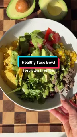 This is how we do taco night🥑 A filling, protein-packed bowl featuring fresh avocado and a creamy Greek yogurt-based cilantro dressing. INGREDIENTS Bowls - 1 cup cooked lean ground beef - 1 Naturipe avocado - 1/2 cup black beans - 1/2 cup corn kernels - 2 Roma tomatoes, diced - 1/2 cup chopped lettuce - 2 handfuls of tortilla chips Dressing - 2 tbsp avocado mayo - 1/4 cup plain 2% Greek yogurt - 1/4 cup fresh cilantro - 2 tbsp fresh lemon or lime juice - 2 tbsp water - 1/2 tsp garlic powder - Salt and pepper to taste DIRECTIONS Prep: Warm beans, corn, and beef if desired. Chop lettuce, tomatoes, and avocado. Blend: Prepare dressing by blending all dressing ingredients in a small blender until smooth. Assemble: Divide lettuce, tomatoes, avocado, beans, corn, beef, and chips between two bowls. Finish: Drizzle dressing over each bowl and serve immediately. #proteinbowl #proteinrecipes #tacobowl #avocado 