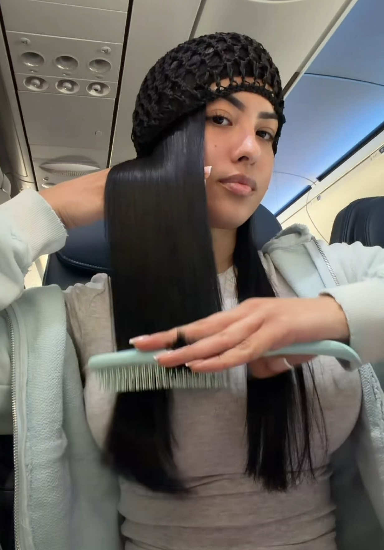 Putting my tubi on as soon as I board the plane to land with the silkiest hair 😇✈️  #tubi #hairwrap #silkyhair #naturalhair #hairtok 