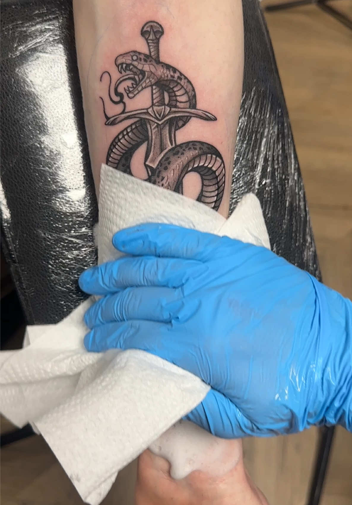 Timeless snake and dagger tattoo, done as a first tattoo for my client 🐍 #snaketattoo #snaketattoos #tattooideas #daggertattoo #tattootiktok 