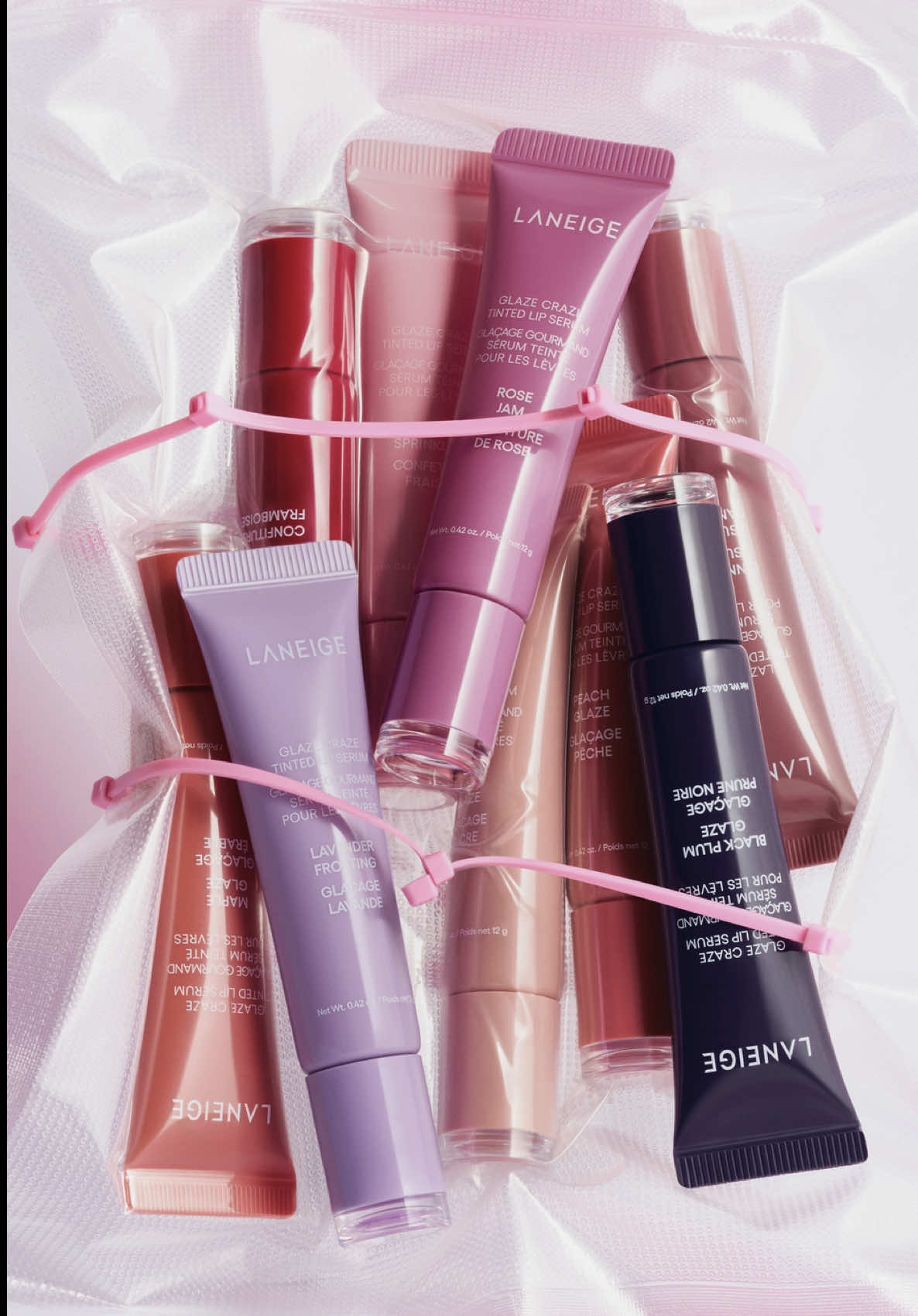 Our NEW Glaze Craze Tinted Lip Serums shades are made to mix, layer, or wear solo across all lip tones 🩷💜🖤 each shade provides: 🍩 buildable color 🍩 glassy glaze finish and nourishing hydration 🍩 custom lip combos or solo color + shine payoff available now to shop @sephoracanada 🛒 #glazecraze #newshades #tintedlipserum #cooltoned #laneige 