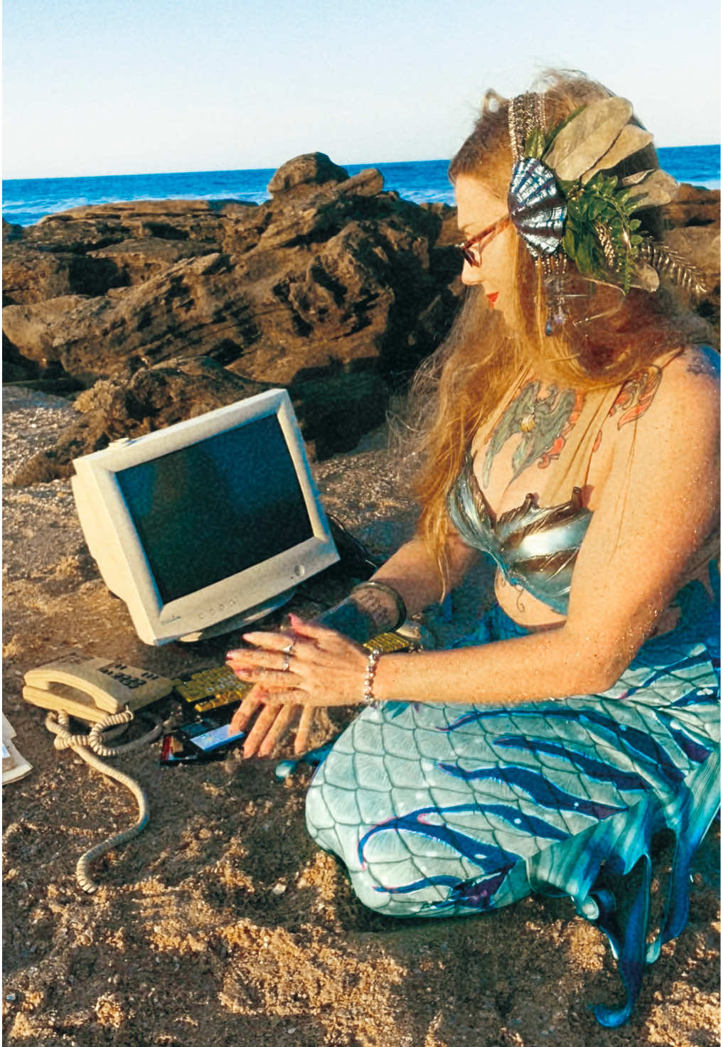 Tapped in, tuned in ☎️ #mermaid #officesiren #vintagetech #beach 