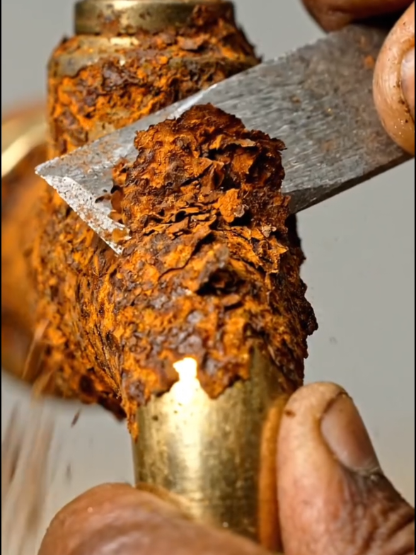 No Way You Saw That Rust Break 😳 This faucet looked completely buried under a thick rust layer. One scrape and the rust suddenly cracks and breaks apart in pieces, revealing smooth metal underneath. The moment happens so fast it’s hard to miss. #ASMR #Rust #Satisfying #MetalWork #OddlySatisfying