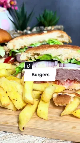 Juicy air fryer burgers with Caesar sauce, red onion, and fresh tomatoes, served with crispy fries. The air fryer makes fries perfectly golden without oil 🤤🔥 Find more recipes  and exact cooking times in my book. Link in bio 🔥📖 #airfryer #airfryerfrau #burgers #trendingfood #EasyRecipes 