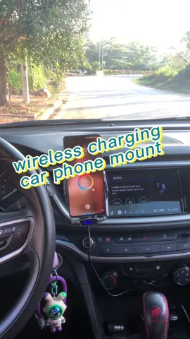 Experience total control with this wave-sensing car charger. It features automatic electric opening and supports 66W super-fast charging for all devices, including Androids via magnetic heads. Switch orientations freely for perfect navigation. Securely mounted on your air vent, the vibrant LED lights bring a high-tech vibe to your drive. #cartiktok  #car #cargoodthings #wirelesscharger #SummerVibes 