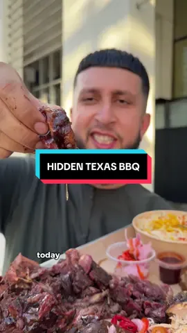 HIDDEN TEXAS BBQ IN DEIRA 🤯 This is a fusion that fully threw me off. A Texas BBQ meat platter served with mandi rice! But after trying it, I can honestly say this place is a hidden gem 💎 The chef here is seriously passionate about Texas BBQ. Proper offset smoker and you can tell he genuinely cares about doing things right while still keeping it affordable. This platter was only 150 AED and comes with a HUGE 1kg beef shank that’s been smoked low and slow for over 18 hours 🔥 The beef had a beautifully balanced flavour but the thing that surprised me most was that they stuff the whole chicken with orange slices 🍊 It might look like decor but it genuinely changes the flavour. You get this subtle sweetness and tanginess running through the chicken while keeping it juicy from the inside. You also get TWO tubs of mandi rice as well as a tub of organic honey and their signature BBQ sauce too.  The house pickles were the dark horse. Salty, punchy and perfect alongside the meat. Same with the beans. Everything worked together really well. 📍 Smoked Meat Factory (SMF) in Deira