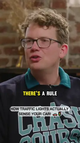 Ever wondered how traffic lights know you're waiting? 🚗🚦 Hank Green explains the underground wire loops that sense your car's metal—and why cyclists get completely left out. 🚲  #trafficlights  #civilengineering  #howitworks  #techfacts  #drivingtips 