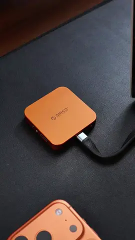 Who says phones only have one port?#Tech #accessories #enclosure #DIY #fc #desk #desksetup #technology #storage #magnetic #techtok #memory #computer #ssd #pssd #phone #orico