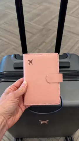 This **passport holder** is awesome! It has **three card slots** and a ring inside to hold your passport securely. It also features **RFID protection**, so your credit cards are safe. The holder is **lightweight** and perfect for travel. Don't miss out on this perfect travel companion. Check it out now! 