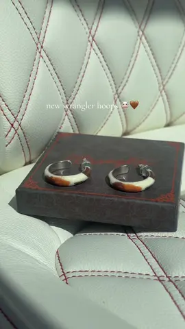 these new wrangler cow print hoops are perfect 🫶 #wrangler #earrings #westernjewelry #western #jewelry 