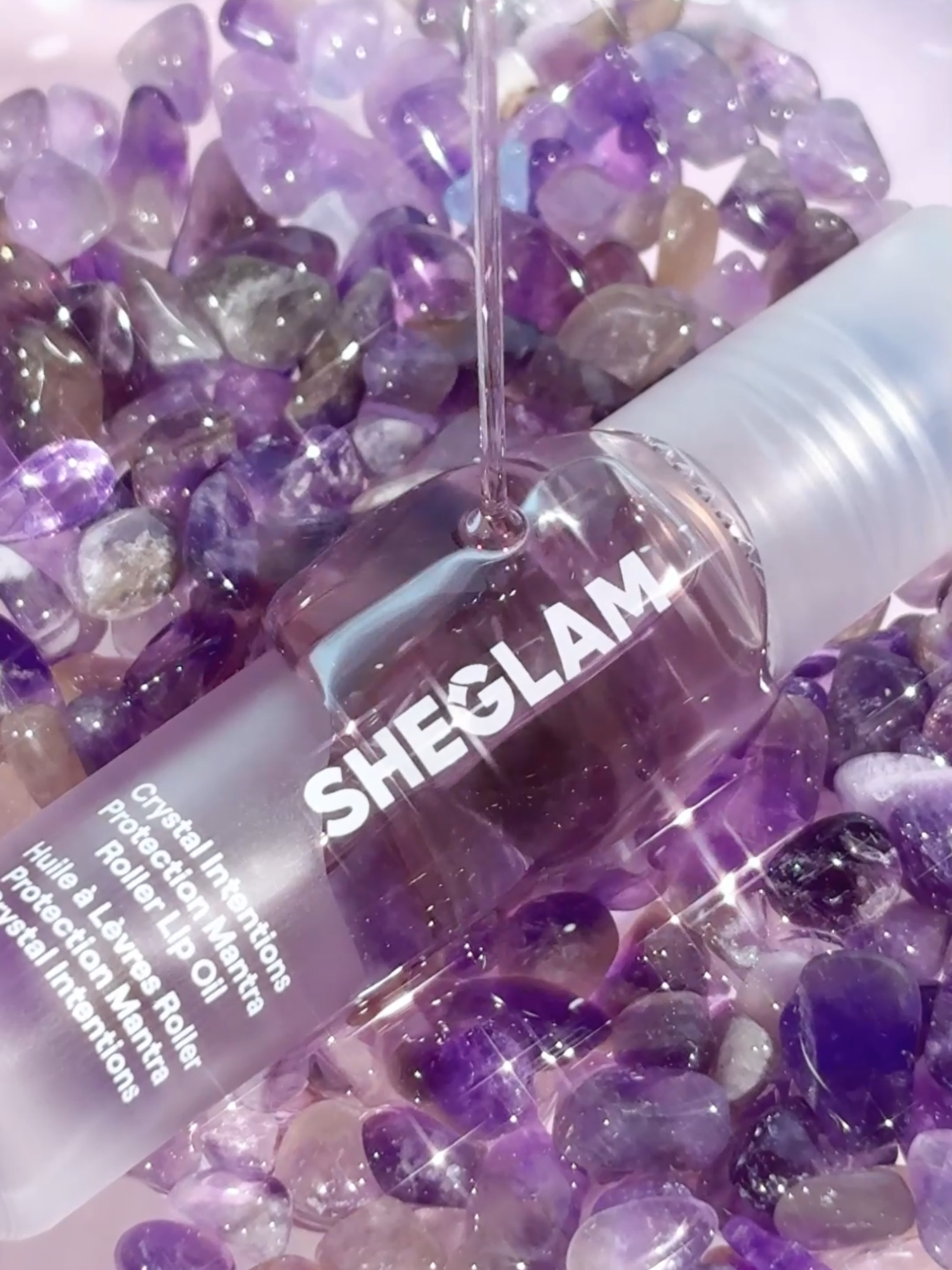 Get intentional with your lip oil 💧💜  ID: 498999634 #lips #lipcare #lipoil #LipTrend #lipmask #lipsmakeup #SHEGLAM #SHEGLAMcollection #SHEGLAMcrystalintentions