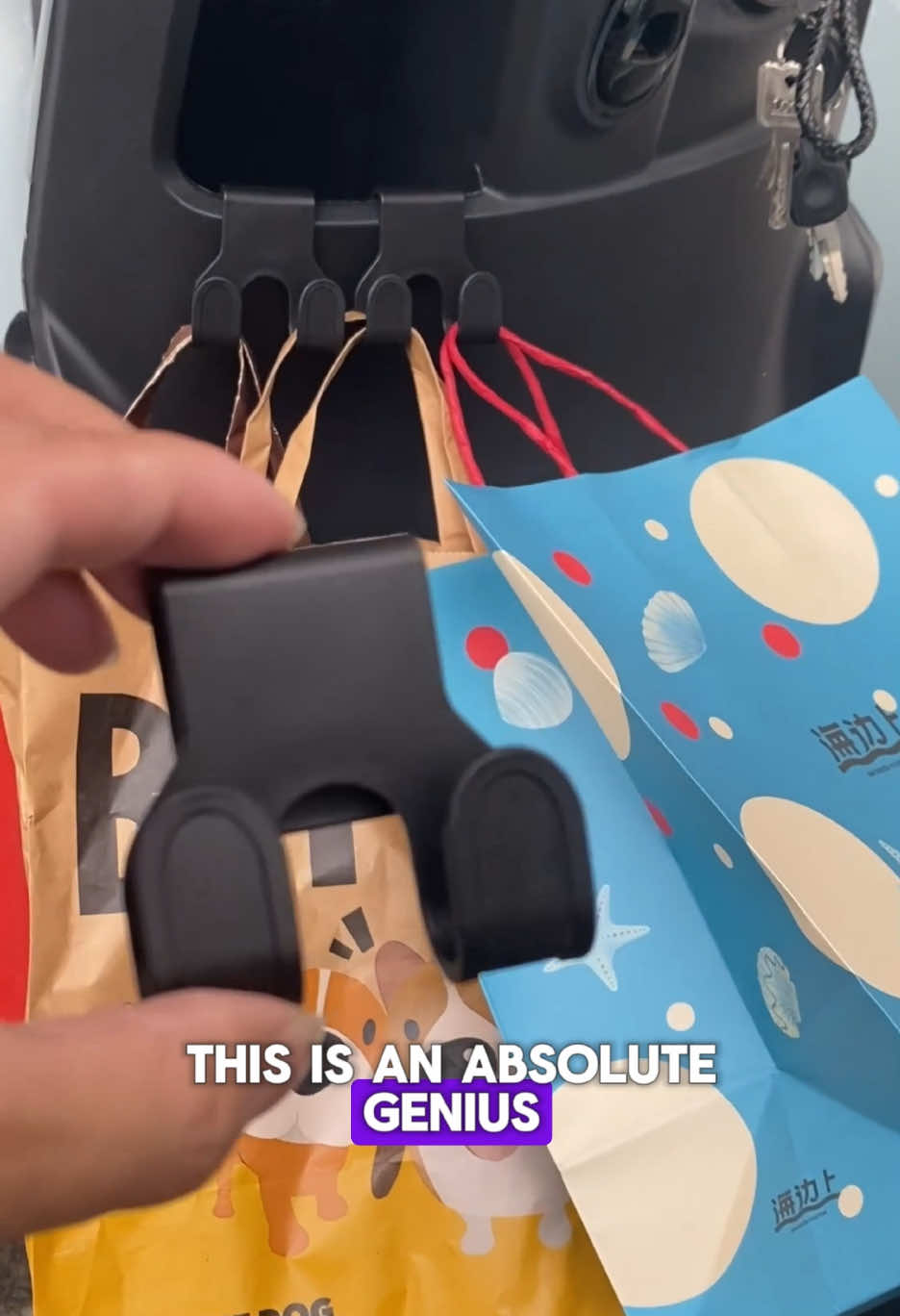 The person who invented this is an absolute genius!GGY#ScooterAccessories #MotorcycleHook #ClipOnHook #ScooterMods#dailycommute 