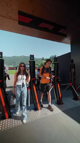 Oscar and Lily arriving at the paddock today ❤️ It's Qualifying Day! 🇦🇹🔥  🎥:@mclarenf1 / @fastestlap_race #oscarpiastri #lilyzneimer #foryoupage #austriangp #f1 