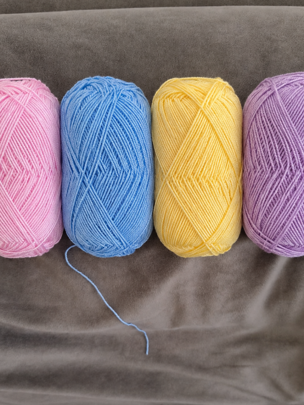 Wait for the magic... 🧶✨ A few colorful yarns are about to turn into something adorable. Every stitch brings the surprise a little closer. 💖💙💛💜 Which color are you rooting for? 👀 💌 Share this with someone who loves handmade creations. #crochetmagic  #amigurumi  #handmadewithlove  #crochetreels  #yarnart 